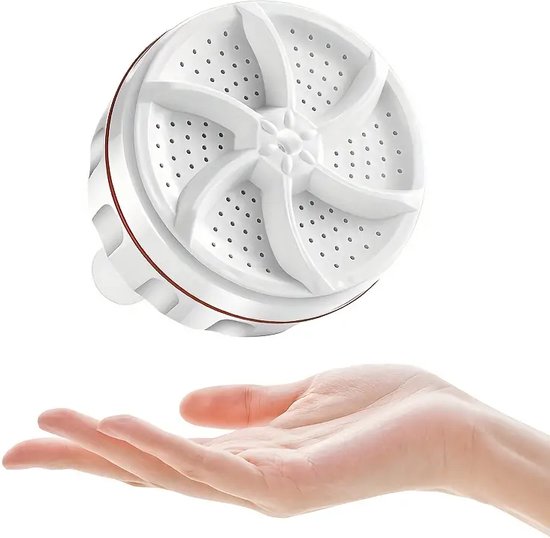 Witte mini-wasmachinetrommel boven een open hand.