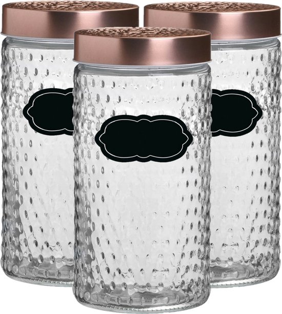 Trois bocaux en verre avec couvercles couleur cuivre et texture de bulles, chacun avec une étiquette noire.