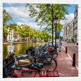 Muursticker - Rij Fiets Geparkeerd langs de Gracht in Amsterdam - 50x50 cm Foto op Muursticker