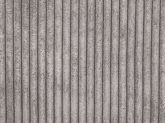 Lichtgrijs corduroy stof met verticale ribbels.