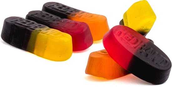 Vier Red Band Drop Fruit Duos snoepjes. De snoepjes zijn rood-zwart, oranje-geel en geel.