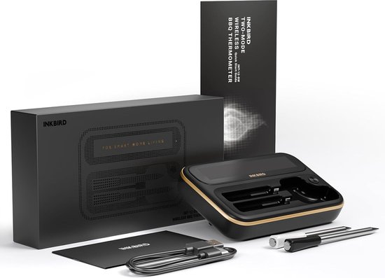 Een zwarte geschenkdoos met gouden letters toont een thermometer en twee probes. Ernaast liggen een oplaadkabel en een handleiding.