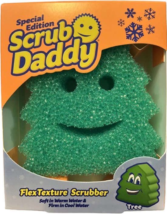 Groene kerstboomvormige Scrub Daddy FlexTexture schuurspons met gezicht, in oranje verpakking.