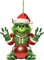 Zelfgemaakte kerstversiering, waaronder een kerstmanornament, een