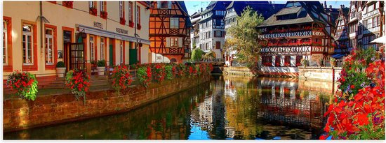 WallClassics - Poster Glossy - Maisons sur Rivière - 60x20 cm Photo sur Papier Poster avec Finition Brillante