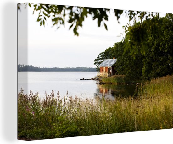Canvas Schilderij Klein huis aan een meer in Finland - 60x40 cm - Wanddecoratie