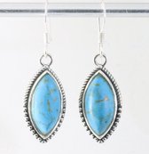 Boucles d'oreilles en argent traité avec turquoise bleue