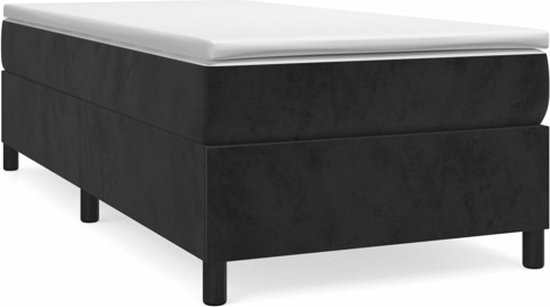 Cadre de lit noir en velours avec matelas et pieds.