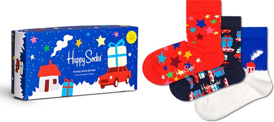 Happy Socks geschenkdoos met drie paar kindersokken: sterren, auto's en een besneeuwd huisje.