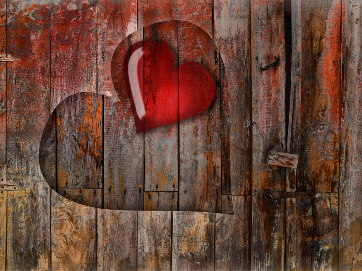 Fotobehang - Hart op houten achtergrond.
