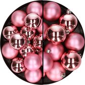 Kerstballen - kunststof - 28x stuks - roze - 4 en 6 cm