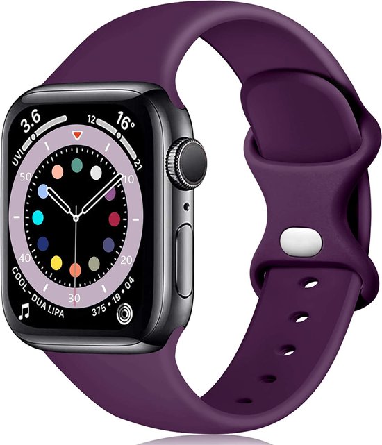 Bracelet de sport violet foncé en silicone autour d'une Apple Watch.