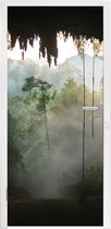 Deursticker Natuurlijke grot in het regenwoud van Maleisië - 90x215 cm - Deurposter