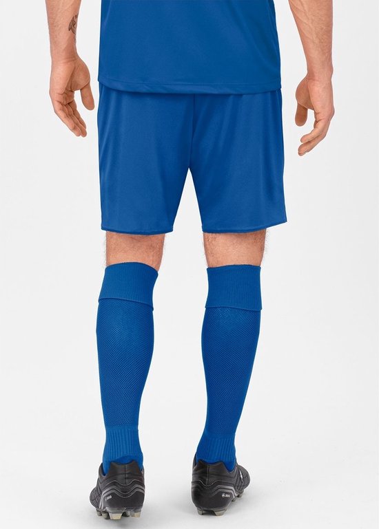 Short de sport bleu garçon vu de dos, avec logo Jako.