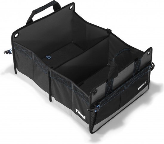 Zwarte Thule opbergtas met handvatten en blauwe stiksels, opgedeeld in compartimenten.