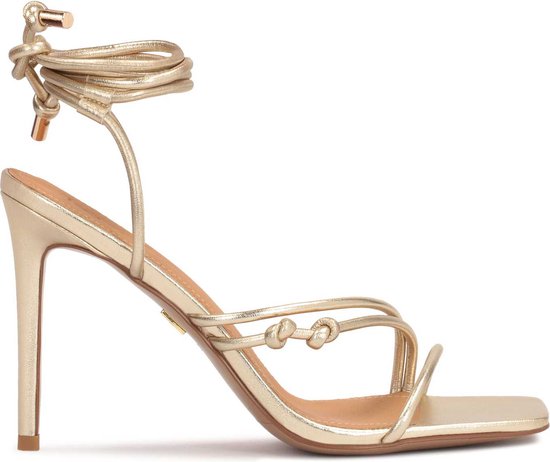 Elegant gold sandals with slender heels