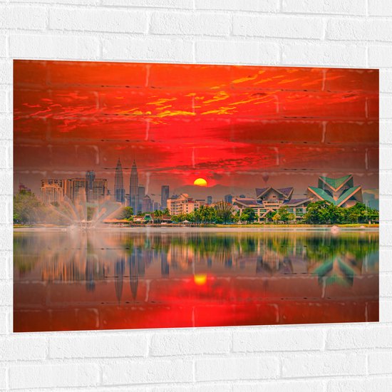 Muursticker - Skyline van De Stad Kuala Lumpur in Indonesië tijdens Zonsondergang - 100x75 cm Foto op Muursticker