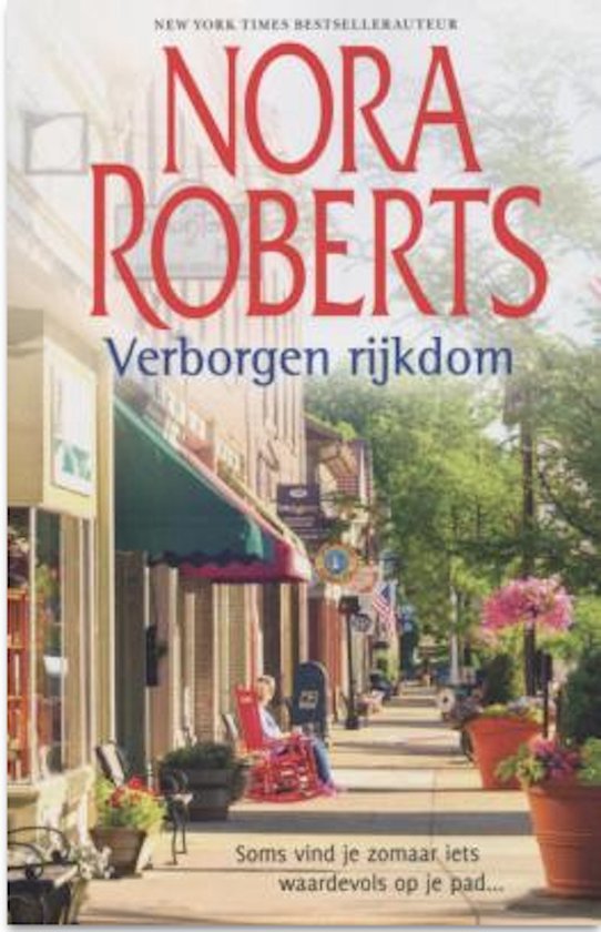 Boekomslag van 'Verborgen rijkdom' door Nora Roberts, een zonnige winkelstraat met een rode schommelstoel.