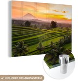 MuchoWow® Glasschilderij 120x80 cm - Schilderij acrylglas - Landschap van Indonesië tijdens zonsondergang - Foto op glas - Schilderijen