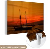 MuchoWow® Glasschilderij 120x80 cm - Schilderij acrylglas - Galjoen tijdens de zonsondergang - Foto op glas - Schilderijen