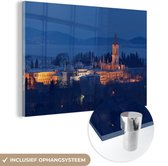 MuchoWow® Glasschilderij 120x80 cm - Schilderij acrylglas - Een verlicht Topkapipaleis in de avond - Foto op glas - Schilderijen