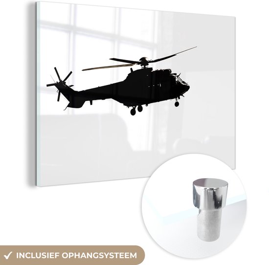 Glasschilderij - Een militaire helikopter tijdens de vlucht - Acrylglas Schilderijen - Foto op Glas