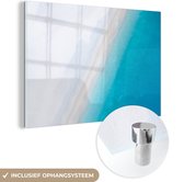 MuchoWow® Glasschilderij 120x80 cm - Schilderij acrylglas - Strand - Zee - Blauw - Foto op glas - Schilderijen