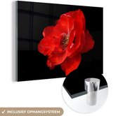 MuchoWow® Glasschilderij 60x40 cm - Schilderij acrylglas - Een rode pioenroos op een zwarte achtergrond - Foto op glas - Schilderijen