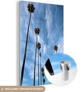 MuchoWow® Glasschilderij 60x90 cm - Schilderij acrylglas - De rijen met palmbomen voor een blauwe lucht - Foto op glas - Schilderijen