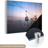 MuchoWow® Glasschilderij 60x40 cm - Schilderij acrylglas - Kabelbaan trekt de zonsondergang in - Foto op glas - Schilderijen