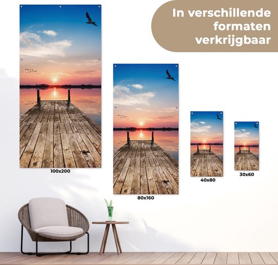 Tuinposter 80x160 cm - Tuindecoratie Steiger - Water - Zonsondergang - Roze - Horizon - Poster voor in de tuin - Buiten decoratie - Schutting tuinschilderij - Tuindoek muurdecoratie - Wanddecoratie balkondoek