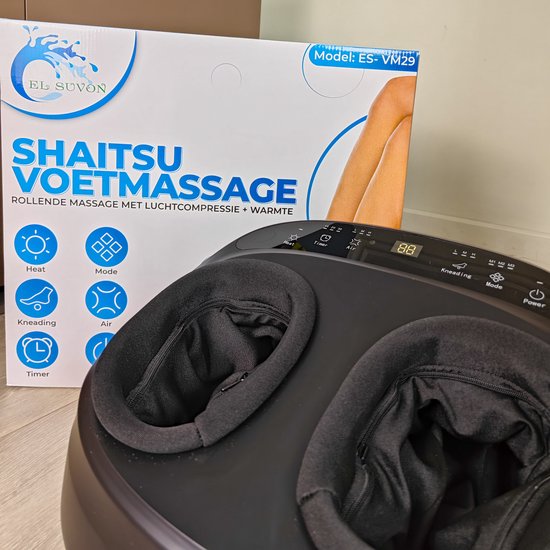 Zwart El Suvon voetmassageapparaat met een doos met 'Shiatsu Voetmassage' erop.