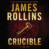 Boek "Crucible" van James Rollins. Gouden letters op een donkere achtergrond met een oude sleutel en een mysterieus symbool.
