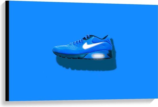 Canvas - Blauwe Nike Schoenen op Blauwe Achtergrond - 90x60cm Foto op  Canvas... | bol.com