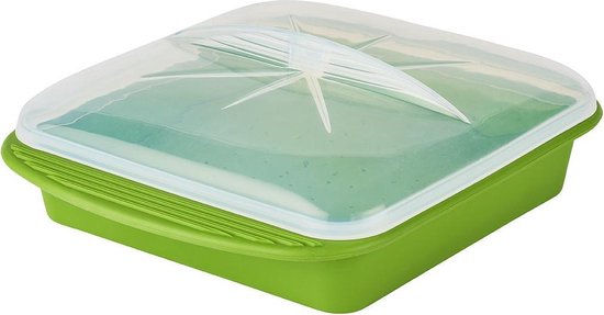 Groene stoompan met doorzichtige deksel met stervormige versiering.