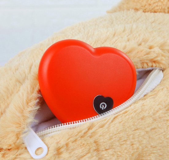 Rood hart met aan/uit-symbool in een rits van een bruine knuffel.