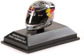 The 1:8 Diecast replica of Sebastien Vettels helmet that he wore during the GP in Abu Dhabi 2010. 

The manufacturer of the helmet is Minichamps.