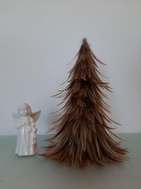 beeldje van een engel en een kerstboom