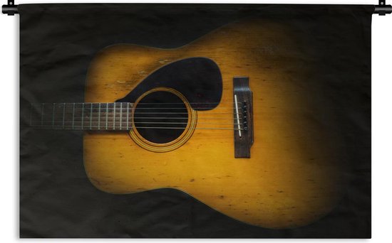 Wandkleed Akoestische gitaar - Oude akoestische gitaar op een donkere achtergrond Wandkleed katoen 150x100 cm - Wandtapijt met foto