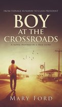 Boekcover: Jongen die meerijdt langs een landweg, met de titel 'Boy at the Crossroads' en 'Mary Ford'.