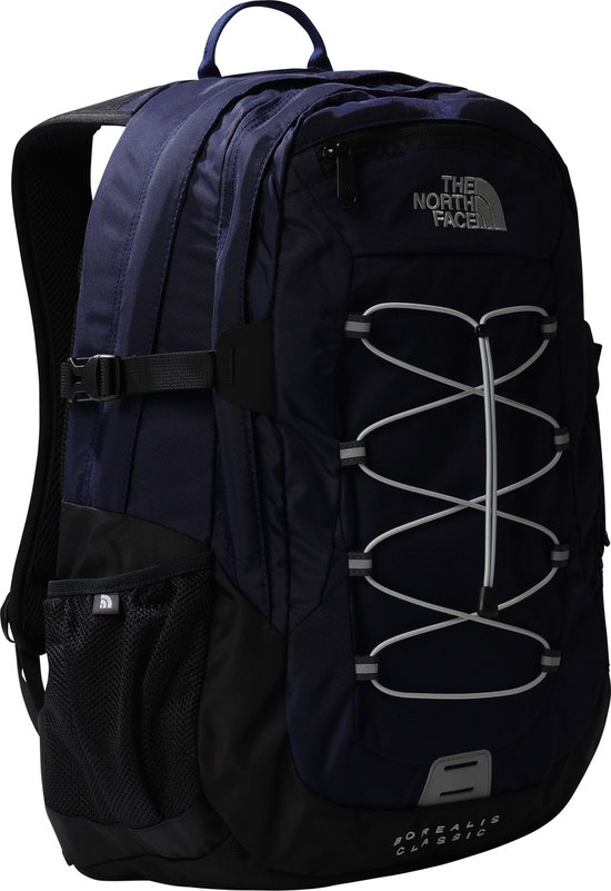 Donkerblauwe The North Face Borealis Classic rugzak met grijs elastiek en reflecterende details.