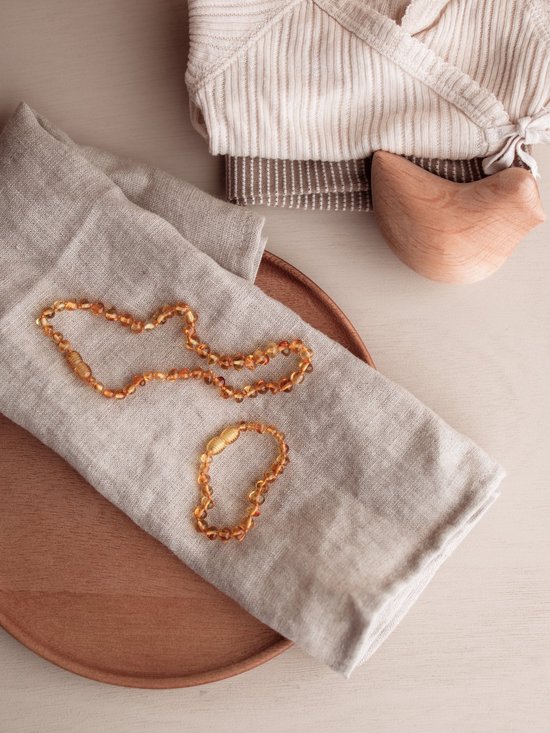 Amberos barnsteen ketting baby/peuter - originele baltische barnsteen - barnsteen ketting baby - kinderketting - natuurlijk - pijnstillend tegen doorkomende tandjes - baby - peuter - Kraamcadeau - baby cadeau - 32 cm - honey van Amber — afbeelding 2