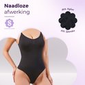 Zwarte corrigerende bodysuit met dunne bandjes. "Naadloze afwerking". Inzet toont 90% nylon, 10% spandex.