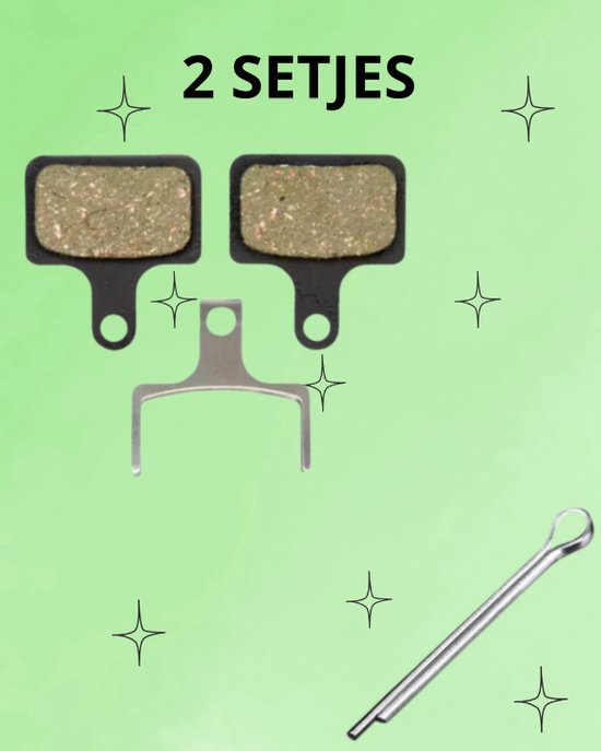 2 setjes remblokken met metalen pinnen en groene/gouden deeltjes, op een lichtgroene achtergrond.