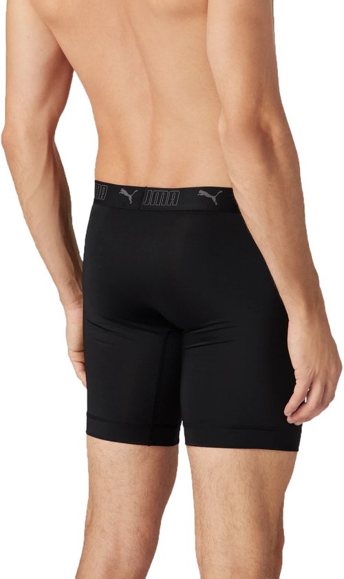 Zwarte boxer met PUMA-logo op de tailleband, detail van de zijkant.