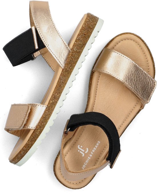 Roze gouden sandalen met klittenbandsluiting en zwarte elastieken band.