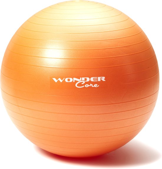 Oranje fitnessbal met ribbelpatroon en 'Wonder Core' logo.