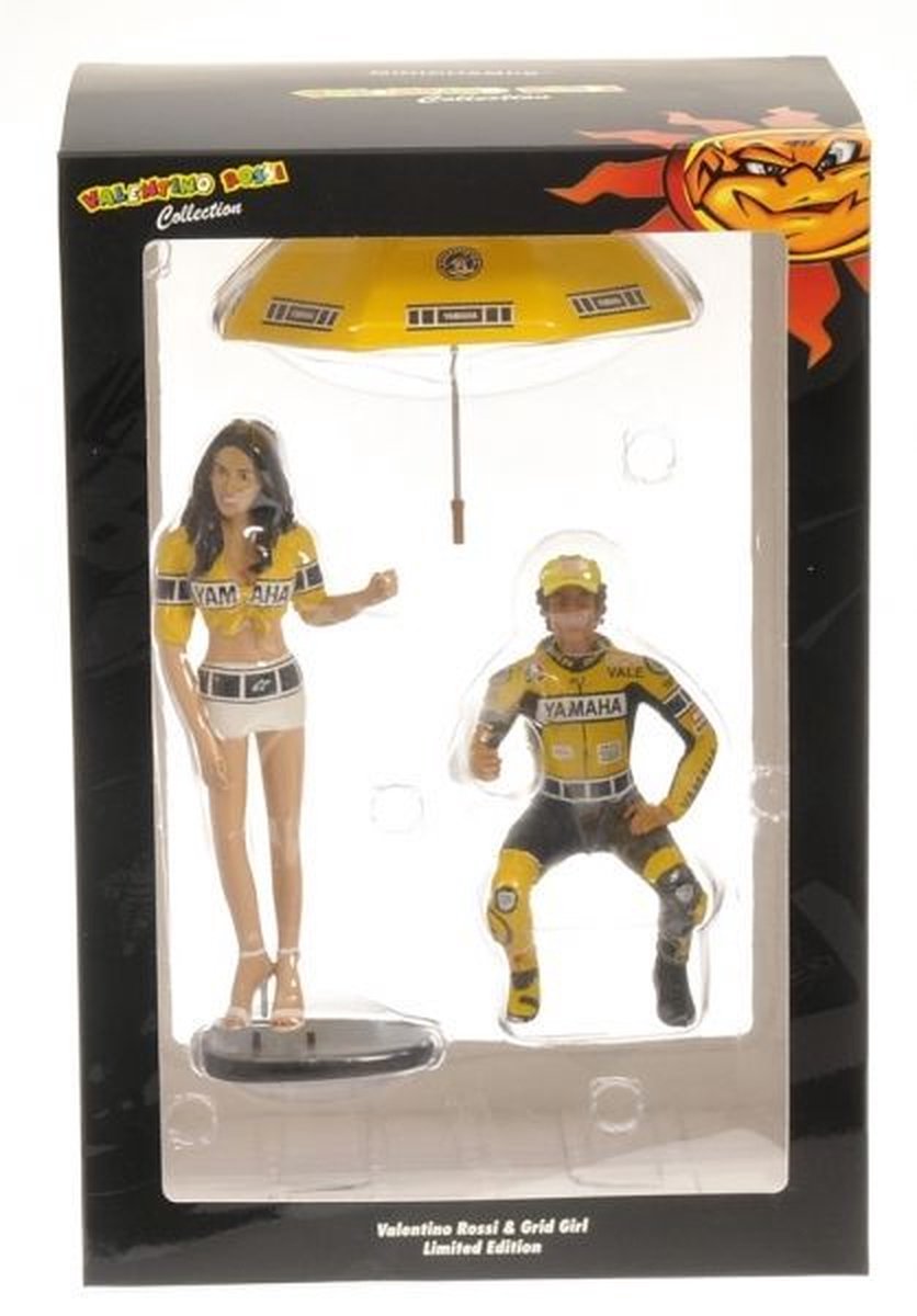 De 1:12 Valentino Rossi en Grid Girl Beeldje van de MotoGP Laguna Seca 2005.De fabrikant van het item is Minichamps.Dit model is alleen online beschikbaar
