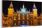 Schilderij - Station Amsterdam Centraal in de nacht — 90x60 cm