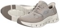 Beige Skechers Slip-ins Glide-Step sneakers met vetersluiting en een grijs detail op de zool.